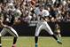 Henne attempts a pass. Everyone wishes he wouldn't.