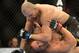 May 26, 2012; Las Vegas, NV, USA; Kyle Kingsbury (top) fights with Glover Teixeira (bottom) during UFC 146 at the MGM Grand Garden event center. Mandatory Credit: Ron Chenoy-US PRESSWIRE