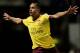 LONDON, ENGLAND - OCTOBER 06: Theo Walcott of Arsenal celebrates after scoring his team's second goal during the Barclays Premier League match between West Ham United and Arsenal at the Boleyn Ground on October 6, 2012 in London, England. (Photo by Shaun Botterill/Getty Images)