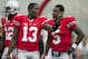 September 8, 2012; Columbus, OH, USA; Ohio State Buckeyes quarterback Kenny Guiton (13) talks with quarterback Braxton Miller (5) before their game against the UCF Knights at Ohio Stadium. Mandatory Credit: Greg Bartram-US PRESSWIRE