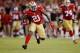 SAN FRANCISCO, CA - OCTOBER 18: Running back Frank Gore #21 of the San Francisco 49ers runs for 37 yards on a play against the Seattle Seahawks at the start of the fourth quarter on October 18, 2012 at Candlestick Park in San Francisco, California. The 49ers won 13-6. (Photo by Brian Bahr/Getty Images)