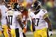 Oct 21, 2012; Cincinnati, OH, USA; Pittsburgh Steelers wide receiver Mike Wallace (17) and running back Jonathan Dwyer (27) celebrate during the second half against the Cincinnati Bengals at Paul Brown Stadium. The Steelers defeated the Bengals 24-17. Mandatory Credit: Frank Victores-US PRESSWIRE