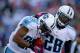 ORCHARD PARK, NY - OCTOBER 21: Chris Johnson #28 and Nate Washington #85 of the Tennessee Titans celebrate Washington's game winning touchdown against the Buffalo Bills at Ralph Wilson Stadium on October 21, 2012 in Orchard Park, New York.Tennessee won 35-34. (Photo by Rick Stewart/Getty Images)