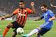 DONETSK, UKRAINE - OCTOBER 23: Alex Teixeira (L) of Shakhtar Donetsk blocks a cross from Juan Mata (R) of Chelsea during the UEFA Champions League Group E match between Shakhtar Donetsk and Chelsea at the Donbass Arena on October 23, 2012 in Donetsk, Ukraine. (Photo by Michael Steele/Getty Images)