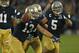 SOUTH BEND, IN - OCTOBER 20: Danny Spond #13 of the Notre Dame Fighting Irish celebrates with teammates including Manti T'eo #5 after intercepting a pass on the next to last play of the game against the BYU Cougars at Notre Dame Stadium on October 20, 2012 in South Bend, Indiana. Notre Dame defeated BYU 17-14. (Photo by Jonathan Daniel/Getty Images)
