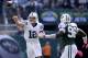 EAST RUTHERFORD, NJ - OCTOBER 14: Andrew Luck #12 of the Indianapolis Colts passes under pressure from Muhammad Wilkerson #96 the New York Jets at MetLife Stadium on October 14, 2012 in East Rutherford, New Jersey. (Photo by Nick Laham/Getty Images)