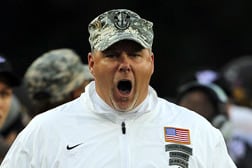 Wyoming coach Christensen suspended 1 week, fined $50K