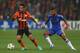 DONETSK, UKRAINE - OCTOBER 23: Alex Teixeira (L) of Shakhtar Donetsk is tracked by Ashley Cole (R) of Chelsea during the UEFA Champions League Group E match between Shakhtar Donetsk and Chelsea at the Donbass Arena on October 23, 2012 in Donetsk, Ukraine. (Photo by Michael Steele/Getty Images)