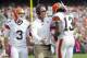 CLEVELAND, OH - OCTOBER 14: Starting quarterback Brandon Weeden #3, Head coach Pat Shurmur and wide receiver Josh Gordon #13 of the Cleveland Browns celebrate during the first quarter after Gordon scored a touchdown against the Cincinnati Bengals at Cleveland Browns Stadium on October 14, 2012 in Cleveland, Ohio. (Photo by Jason Miller/Getty Images)