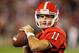 September 22, 2012; Athens, GA, USA; Georgia Bulldogs quarterback Aaron Murray (11) warms up on the sidelines in the game against the Vanderbilt Commodores at Sanford Stadium. Georgia won 48-3. Mandatory Credit: Daniel Shirey-US PRESSWIRE