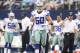 Sep 23, 2012; Arlington, TX, USA; Dallas Cowboys linebacker Sean Lee (50) runs on to the field after a time out during the fourth quarter against the Tampa Bay Buccaneers at Cowboys Stadium. Cowboys beat the Buccaneers 16-10. Mandatory Credit: Tim Heitman-US PRESSWIRE