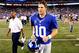 EAST RUTHERFORD, NJ - SEPTEMBER 05: Quarterback Eli Manning #10 of the New York Giants runs off of the field after losing to the Dallas Cowboys by the score of 24-17 during the 2012 NFL season opener at MetLife Stadium on September 5, 2012 in East Rutherford, New Jersey. (Photo by Jeff Zelevansky/Getty Images)