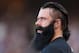 SAN FRANCISCO, CA - SEPTEMBER 22: Brian Wilson of the San Francisco Giants stands outside the dugout for the National Anthem before their against the San Diego Padres at AT&T Park on September 22, 2012 in San Francisco, California. (Photo by Ezra Shaw/Getty Images)