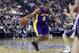 April 26, 2012; Sacramento, CA, USA; Los Angeles Lakers guard Andrew Goudelock (0) drives in against the Sacramento Kings during the second quarter at Power Balance Pavilion. Mandatory Credit: Kelley L Cox-US PRESSWIRE