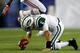 FOXBORO, MA - OCTOBER 21: Mark Sanchez #6 of the New York Jets is hurdled by Tavon Wilson #27 of the New England Patriots during the game on October 21, 2012 at Gillette Stadium in Foxboro, Massachusetts. (Photo by Jared Wickerham/Getty Images)