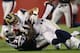 FOXBORO, MA - AUGUST 26: Danny Amendola #16 of the St. Louis Rams is tackled by Devin McCourty #32 of the New England Patriots on August 26, 2010 at Gillette Stadium in Foxboro, Massachusetts. (Photo by Elsa/Getty Images)