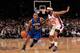 NEW YORK, NY - MARCH 28: Jameer Nelson #14 of the Orlando Magic drives against Baron Davis #85 of the New York Knicks at Madison Square Garden on March 28, 2012 in New York City. NOTE TO USER: User expressly acknowledges and agrees that, by downloading and/or using this Photograph, user is consenting to the terms and conditions of the Getty Images License Agreement. (Photo by Chris Trotman/Getty Images)