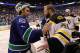 VANCOUVER, BC - JUNE 15: Roberto Luongo (L) #1 of the Vancouver Canucks congratulates Tim Thomas #30 of the Boston Bruins after defeating the Vancouver Canucks in Game Seven of the 2011 NHL Stanley Cup Final at Rogers Arena on June 15, 2011 in Vancouver, British Columbia, Canada. The Boston Bruins defeated the Vancouver Canucks 4 to 0. (Photo by Bruce Bennett/Getty Images)