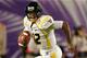MIAMI GARDENS, FL - JANUARY 04: Geno Smith #12 of the West Virginia Mountaineers rolls out of the pocket in the first half against the Clemson Tigers during the Discover Orange Bowl at Sun Life Stadium on January 4, 2012 in Miami Gardens, Florida. (Photo by Streeter Lecka/Getty Images)