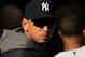 DETROIT, MI - OCTOBER 18: Alex Rodriguez #13 of the New York Yankees looks on from the dugout against the Detroit Tigers during game four of the American League Championship Series at Comerica Park on October 18, 2012 in Detroit, Michigan. The Tigers won 8-1. (Photo by Jonathan Daniel/Getty Images)