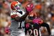 CLEVELAND, OH - OCTOBER 14: Wide receiver Josh Gordon #13 of the Cleveland Browns catches a touchdown pass in front of safety Reggie Nelson of the Cincinnati Bengals at Cleveland Browns Stadium on October 14, 2012 in Cleveland, Ohio. (Photo by Matt Sullivan/Getty Images)