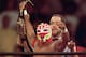 SAN DIEGO - JULY 12: New cruiserweight champion Rey Mysterio Jr acknowledges the crowd after defeating Jericho during the WWE Bash at the Beach event at Cox Arena in San Diego, California on July 12, 1998. (Photo by Elsa /Getty Images)