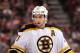 GLENDALE, AZ - DECEMBER 28: Patrice Bergeron #37 of the Boston Bruins skates up to face off during the NHL game against the Phoenix Coyotes at Jobing.com Arena on December 28, 2011 in Glendale, Arizona. The Bruins defeated the Coyotes 2-1 in overtime. (Photo by Christian Petersen/Getty Images)