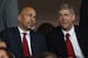 LONDON, ENGLAND - SEPTEMBER 28: Arsene Wenger manager of Arsenal (R) and Ivan Gazidis, CEO of Arsenal (L) look on prior to the UEFA Champions League Group F match between Arsenal and Olympiacos at the Emirates Stadium on September 28, 2011 in London, England. (Photo by Clive Rose/Getty Images)