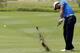 KUALA LUMPUR, MALAYSIA - OCTOBER 25: Tiger Woods of USA plays a shot on the 16th hole during Round One of the 2012 CIMB Classic at the Mines Resort and Golf Club on October 25, 2012 in Kuala Lumpur, Malaysia. (Photo by Stanley Chou/Getty Images)