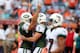 MIAMI GARDENS, FL - SEPTEMBER 23: Kicker Nick Folk #2 (L) of the New York Jets celebrates a game winning kick against the Miami Dolphins at Sun Life Stadium on September 23, 2012 in Miami Gardens, Florida. The Jets defeated the Dolphins 23-20 in overtime. (Photo by Marc Serota/Getty Images)