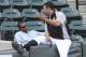 CHICAGO, IL - JUNE 07: Ozzie Guillen # 13 manager of the Chicago White Sox (R) talks with White Sox General Manager Ken Williams before the game against the Seattle Mariners on June 7, 2011 at U.S. Cellular Field in Chicago, Illinois. (Photo by David Banks/Getty Images)