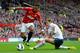 MANCHESTER, ENGLAND - SEPTEMBER 29: Nani of Manchester United evades the challenge from Jan Vertonghen of Tottenham Hotspur during the Barclays Premier League match between Manchester United and Tottenham Hotspur at Old Trafford on September 29, 2012 in Manchester, England. (Photo by Shaun Botterill/Getty Images)
