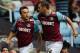 LONDON, ENGLAND - SEPTEMBER 24: Mark Noble (L) of West Ham celebrates scoring the first goal of the game from the penalty spot with team mate Kevin Nolan during the npower Championship match between West Ham United and Peterborough United at Boleyn Ground on September 24, 2011 in London, England. (Photo by Dean Mouhtaropoulos/Getty Images)