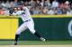 Jul 15, 2012; Seattle, WA, USA; Seattle Mariners shortstop Brendan Ryan (26) throws the ball during the game against the Texas Rangers at Safeco Field. Texas defeated Seattle 4-0. Mandatory Credit: Steven Bisig-US PRESSWIRE