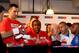 HAMBURG, GERMANY - JULY 01: Wladimir Klitschko (L) and his trainer Emanuel Steward (C) discuss gloves with the trainer of David Haye Adam Booth during the weigh in for his upcoming heavy weight title fight with David Haye at Karstadt Sports shopping centre on July 1, 2011 in Hamburg, Germany. (Photo by Scott Heavey/Getty Images)