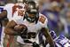 MINNEAPOLIS, MN - OCTOBER 25: Doug Martin #22 of the Tampa Bay Buccaneers avoids a tackle by Jasper Brinkley #54 of the Minnesota Vikings during the first quarter of the game on October 25, 2012 at Mall of America Field at the Hubert H. Humphrey Metrodome in Minneapolis, Minnesota. (Photo by Hannah Foslien/Getty Images)