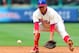 PHILADELPHIA, PA - MAY 15: Second Baseman Freddy Galvis #13 of the Philadelphia Phillies fields a ground ball against the Houston Astros in a MLB baseball game on May 15, 2012 at Citizens Bank Park in Philadelphia, Pennsylvania. (Photo by Rich Schultz/Getty Images)