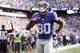 Oct 21, 2012; East Rutherford, NJ, USA; New York Giants wide receiver Victor Cruz (80) does his salsa dance in the end zone after his game-winning touchdown late in the second half against the Washington Redskins at MetLife Stadium. Mandatory Credit: Andrew Mills/THE STAR-LEDGER via US PRESSWIRE