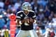 CHARLOTTE, NC - OCTOBER 21: Tony Romo #9 of the Dallas Cowboys during their game at Bank of America Stadium on October 21, 2012 in Charlotte, North Carolina. (Photo by Streeter Lecka/Getty Images)