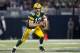 ST. LOUIS, MO - OCTOBER 21: Quarterback Aaron Rodgers #12 of the Green Bay Packers looks to pass while running to the outside during the game against St. Louis Rams at the Edward Jones Dome on October 21, 2012 in St. Louis, Missouri. (Photo by David Welker/Getty Images)