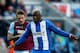 WIGAN, ENGLAND - OCTOBER 27: Arouna Kone (R) of Wigan in action with George McCartney of West Ham during the Barclays Premier League match between Wigan Athletic and West Ham United at the DW Stadium on October 27, 2012 in Wigan, England. (Photo by Paul Thomas/Getty Images)