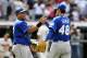 CLEVELAND, OH - AUGUST 28: Catcher Brayan Pena #27 celebrates with closing pitcher Joakim Soria #48 of the Kansas City Royals after they defeated the Cleveland Indians 2-1 at Progressive Field on August 28, 2011 in Cleveland, Ohio. (Photo by Jason Miller/Getty Images)