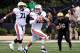 NASHVILLE, TN - OCTOBER 20: Quarterback Clint Moseley #15 of the Auburn Tigers rolls out to throw a pass against the Vanderbilt Commodores at Vanderbilt Stadium on October 20, 2012 in Nashville, Tennessee. (Photo by Frederick Breedon/Getty Images)