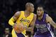 Oct 21, 2012; Los Angeles, CA, USA; Los Angeles Lakers shooting guard Kobe Bryant (24) drives against Sacramento Kings shooting guard Marcus Thornton (23) during the preseason game at the Staples Center. Mandatory Credit: Richard Mackson-US PRESSWIRE