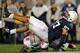 A Nittany Lions' defender takes a tumble against Ohio State Saturday