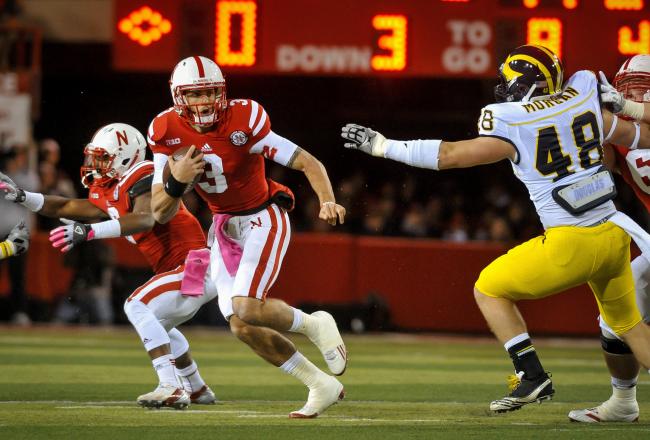 Taylor Martinez has taken punishment all night long.