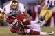 NORMAN, OK - OCTOBER 27: Kenny Stills #4 of the Oklahoma Sooners is tackled by Manti Te'o #5 of the Notre Dame Fighting Irish at Gaylord Family Oklahoma Memorial Stadium on October 27, 2012 in Norman, Oklahoma. (Photo by Ronald Martinez/Getty Images)