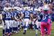 Oct 21, 2012; Indianapolis, IN, USA; Indianapolis Colts quarterback Andrew Luck (12) high fives the team during player introductions before the game against the Cleveland Browns at Lucas Oil Stadium. Indianapolis defeats Cleveland 17-13. Mandatory Credit: Brian Spurlock-US PRESSWIRE