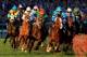 LOUISVILLE, KY - NOVEMBER 05: The field heads into turn one in the Breeders' Cup Mile during the 2011 Breeders' Cup World Championships at Churchill Downs on November 5, 2011 in Louisville, Kentucky. (Photo by Matthew Stockman/Getty Images)