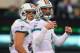 Oct 28, 2012; East Rutherford, NJ, USA; Miami Dolphins quarterback Matt Moore (8) looks to the sideline for a play during the second half at MetLIfe Stadium. The Dolphins defeated the Jets 30-9. Mandatory Credit: Ed Mulholland-US PRESSWIRE